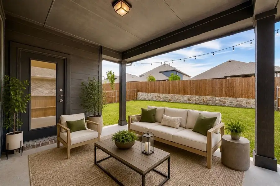 Exterior details and patio area of a home in The Villages of Hurricane Creek, Anna (Image 3).