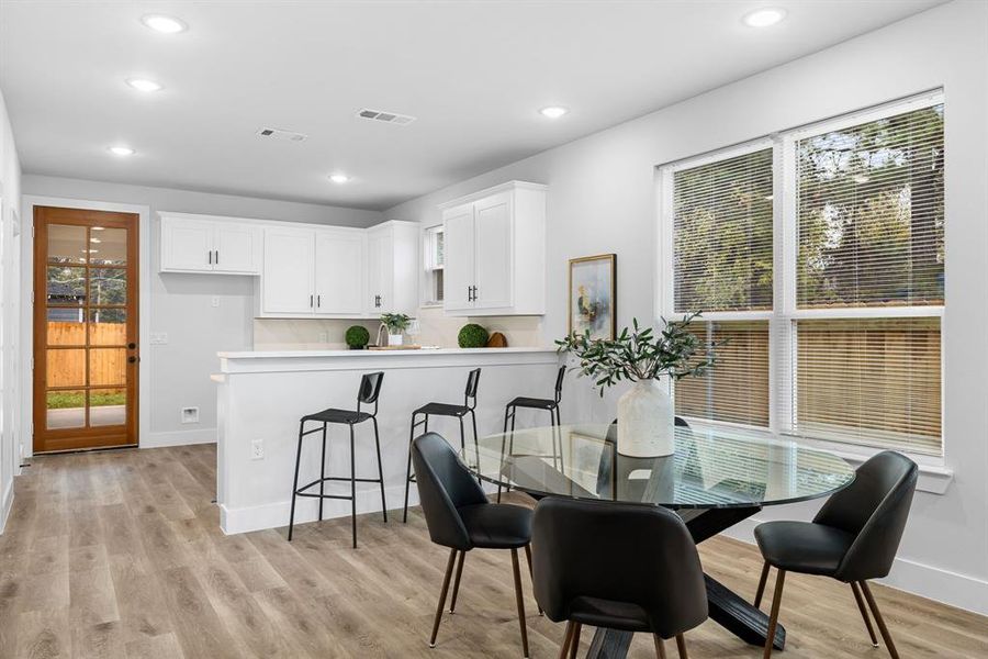 Dining room featuring light wood-type flooring