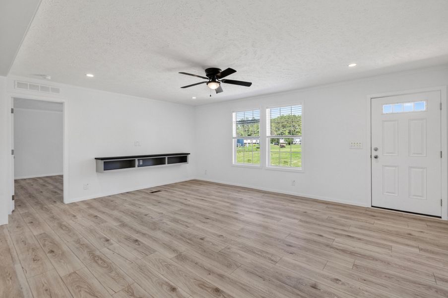 Spacious, unfurnished interior of a new home in , Cross (Image 25).
