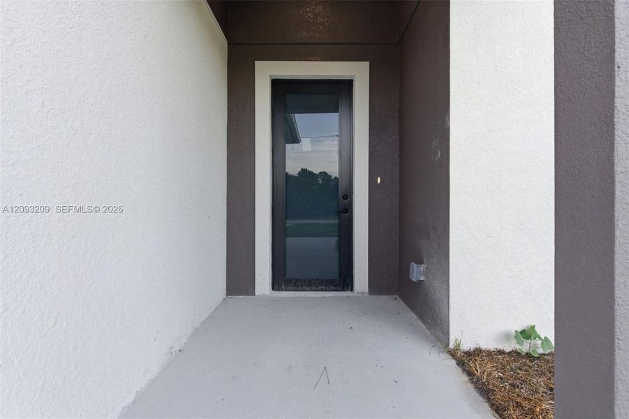 Exterior details and patio area of a home in , Lehigh Acres (Image 3).