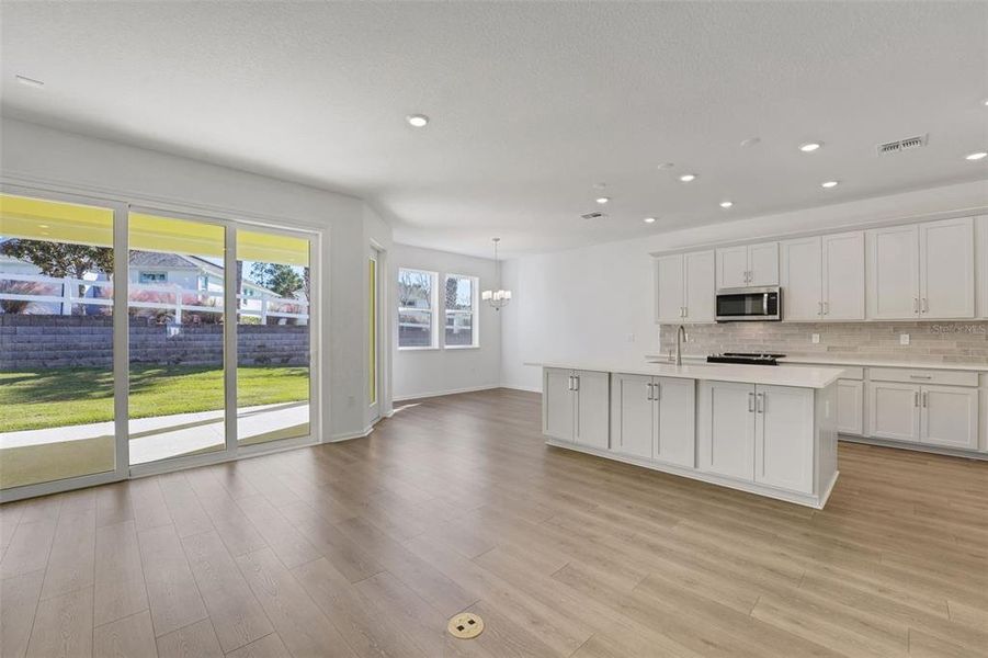 Spacious, unfurnished interior of a new home in Green Key Village, Lady Lake (Image 28).