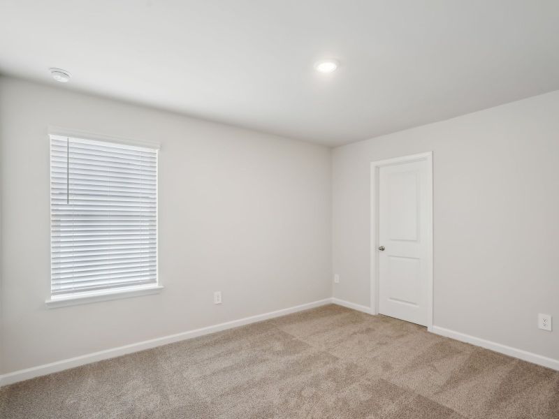 Spacious, unfurnished interior of a new home in Martin Springs - Cottage Series, Lawrenceville (Image 17).
