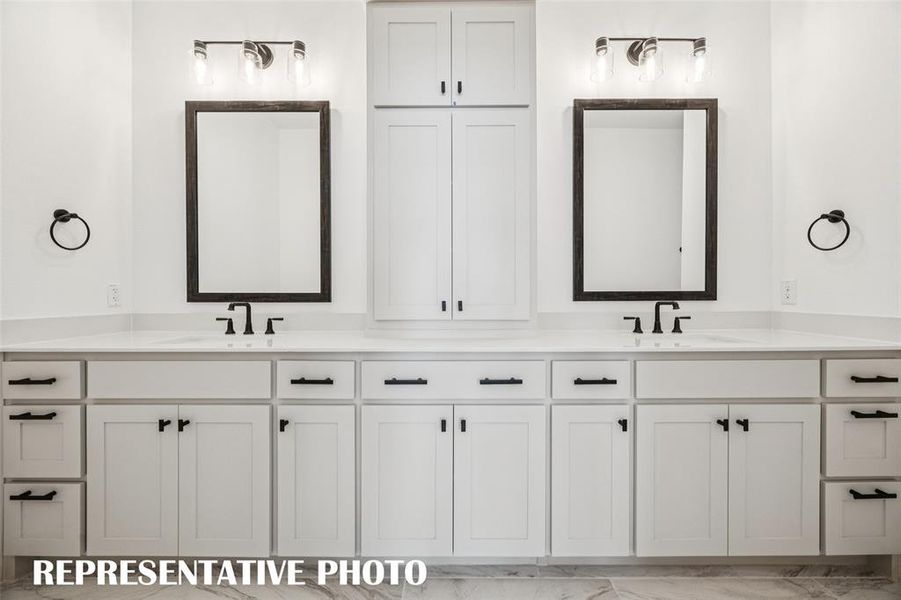 Fantastic storage, ample counter space and outstanding room for two in this dream owner's bath!  REPRESENTATIVE PHOTO