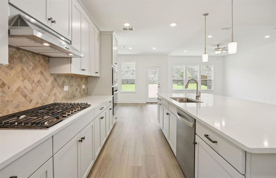 Kitchen featuring a large island ideal for informal dining and gatherings *Real home pictured Kitchen featuring a large island ideal for informal dining and gatherings *Real home pictured