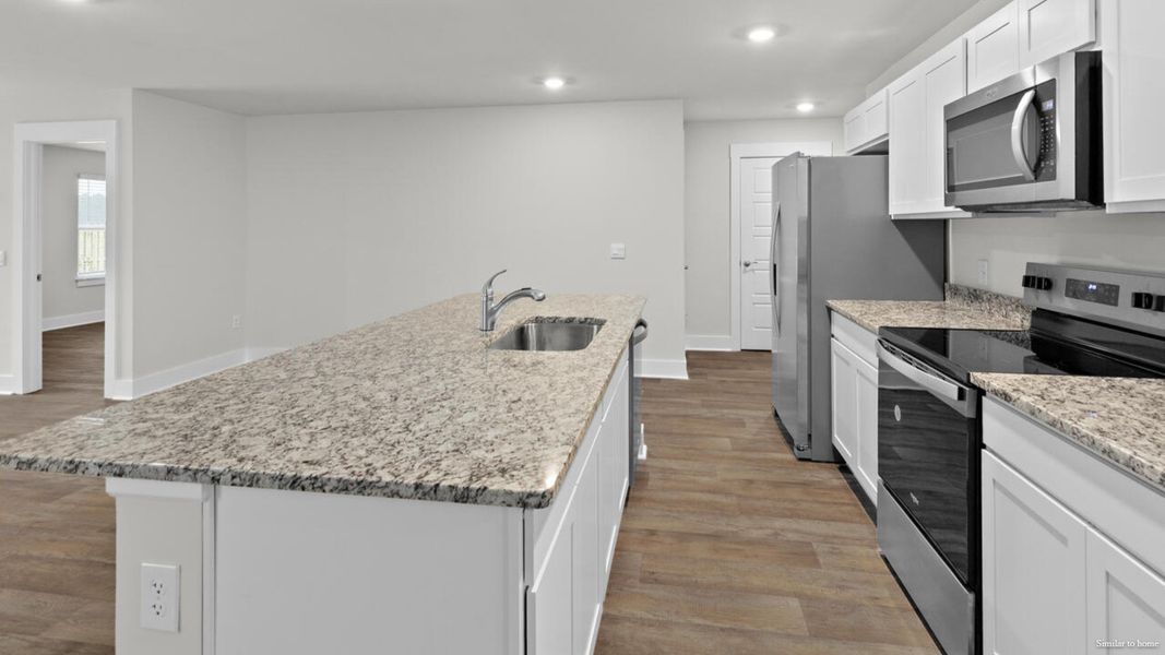 Furnished interior view inside a new home in Vineyard Trail, Jacksonville (Image 8).