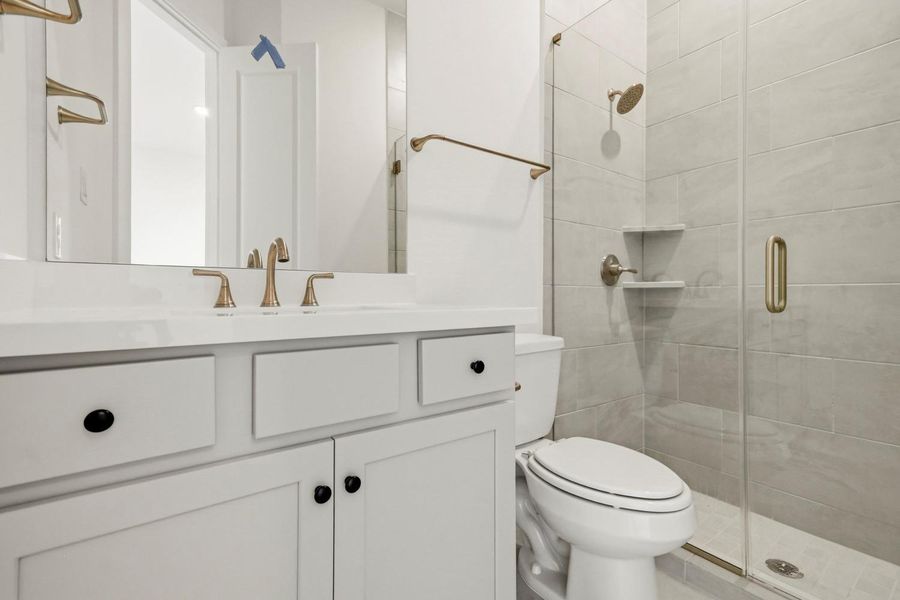 Furnished interior view inside a new home in Dunham Pointe 70', Cypress (Image 9).