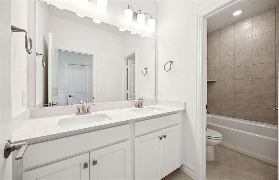 Spacious secondary bathroom with double vanity Spacious secondary bathroom with double vanity