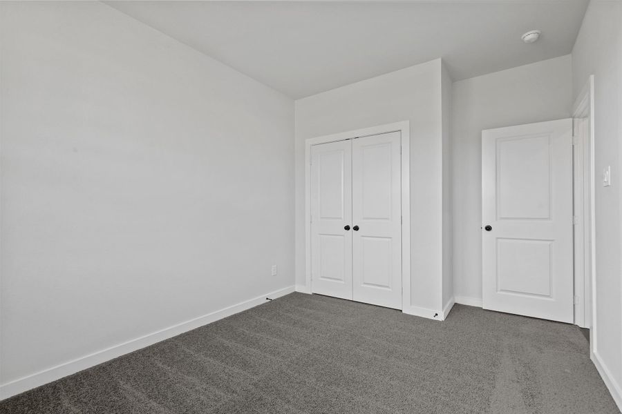 Representative unfurnished interior of a home built from the Garrison II by Cheldan Homes in Stoneview, Glen Rose (Image 56).