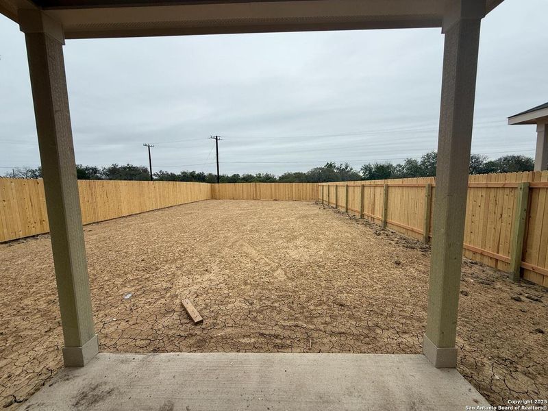 Exterior details and patio area of a home in Meadows at Hennersby Hollow 40's, San Antonio (Image 4).