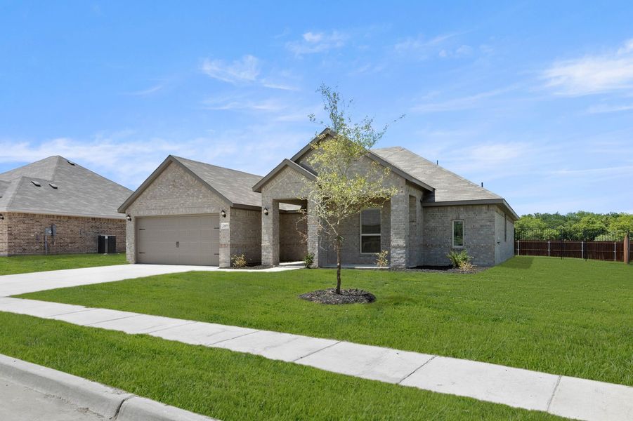 Front exterior of a new home in Mountain Valley Lake, Burleson, TX, highlighting curb appeal (Image 2). Front exterior of a new home in Mountain Valley Lake, Burleson, TX, highlighting curb appeal (Image 2).