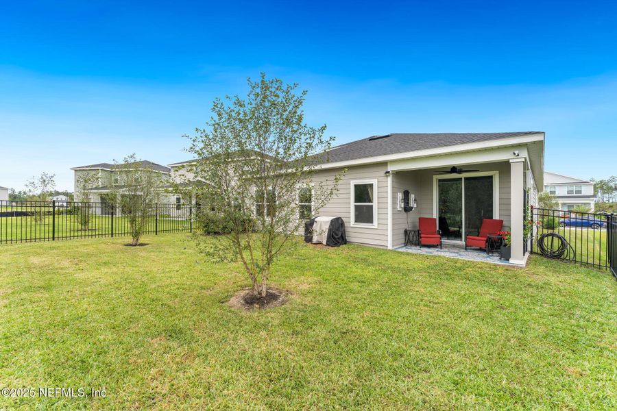 Exterior details and patio area of a home in Seminole Palms Single-Family Homes, Palm Coast (Image 3).