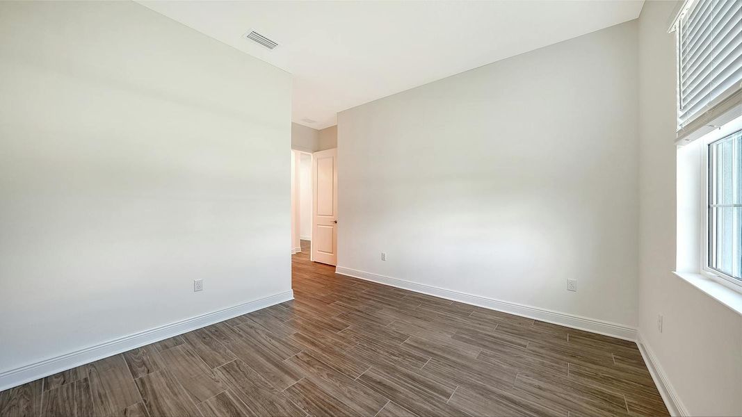 Spacious, unfurnished interior of a new home in Canoe Creek Real Estate and Homes for Sale in Parrish, FL - Neal Communities, Parrish (Image 34). Spacious, unfurnished interior of a new home in Canoe Creek Real Estate and Homes for Sale in Parrish, FL - Neal Communities, Parrish (Image 34).