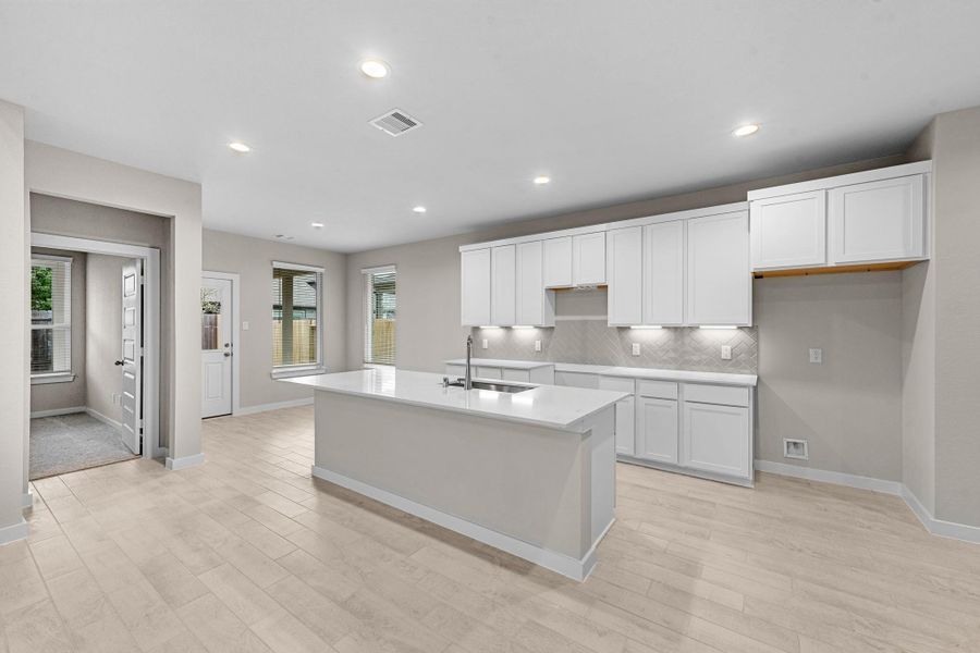 Furnished interior view inside a new home in Barton Creek Ranch, Conroe (Image 7).