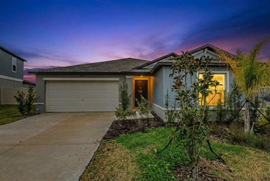 Front exterior of a new home in Mirada: The Estates II, San Antonio, FL, highlighting curb appeal (Image 21).