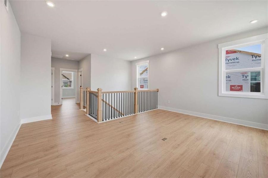 Spacious, unfurnished interior of a new home in The Paddocks at Doc Hughes, Buford (Image 38).