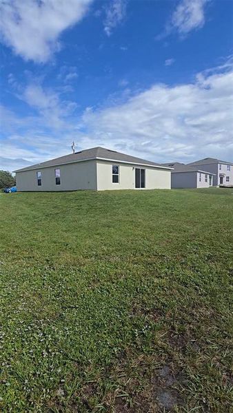 Exterior details and patio area of a home in Poinciana, Poinciana (Image 4).
