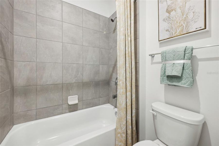 Furnished interior view inside a new home in Groves at Grand Island, Grand Island (Image 26).