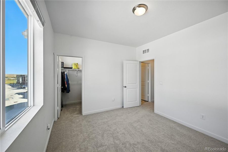 Secondary Bedroom with walk-in closet