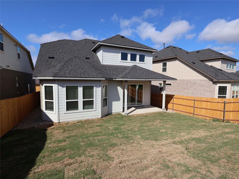 Exterior details and patio area of a home in Cedar Brook, Leander (Image 3). Exterior details and patio area of a home in Cedar Brook, Leander (Image 3).