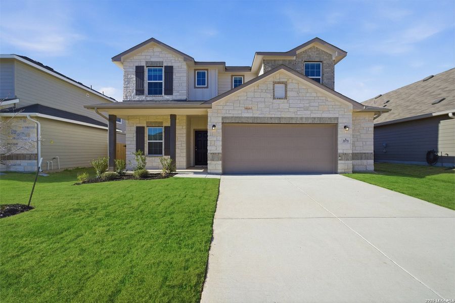Front exterior of a new home in Cloud Country, New Braunfels, TX, highlighting curb appeal (Image 1). Front exterior of a new home in Cloud Country, New Braunfels, TX, highlighting curb appeal (Image 1).