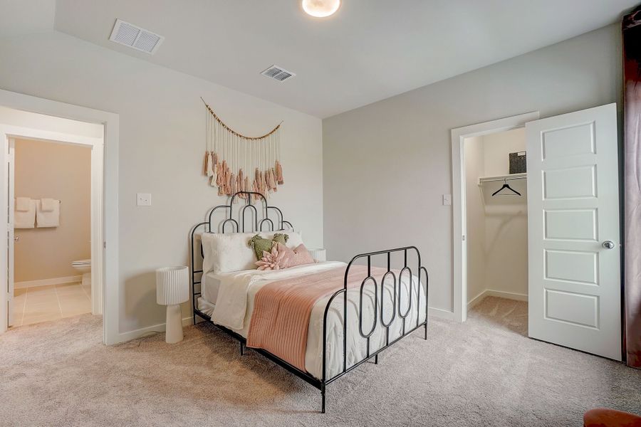 Bedroom in the Stanley II home plan by Trophy Signature Homes - REPRESENTATIVE PHOTO