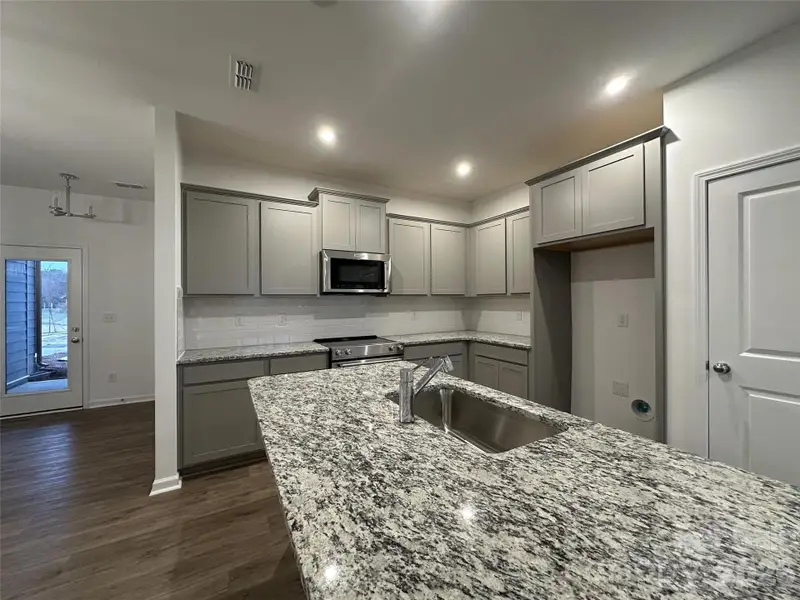 Furnished interior view inside a new home in , Concord (Image 5).