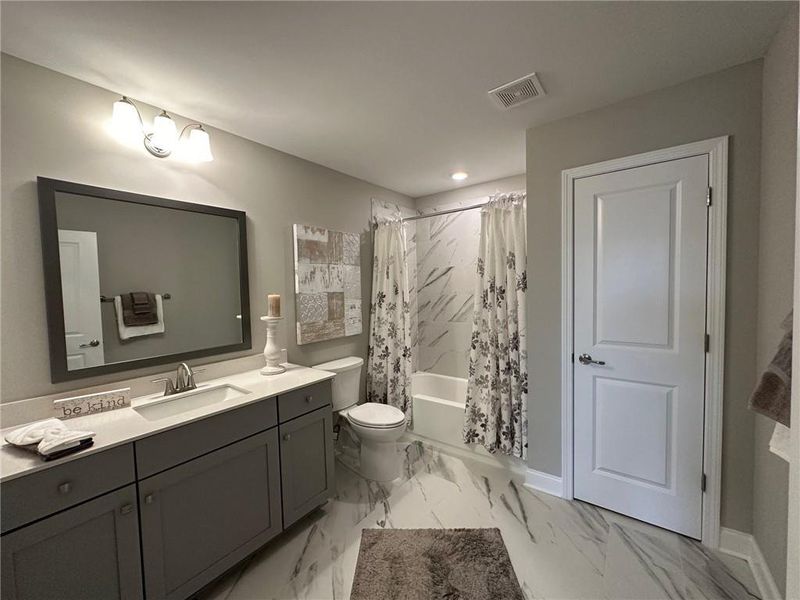 Furnished interior view inside a new home in Orchards of South Forsyth, Cumming (Image 13).