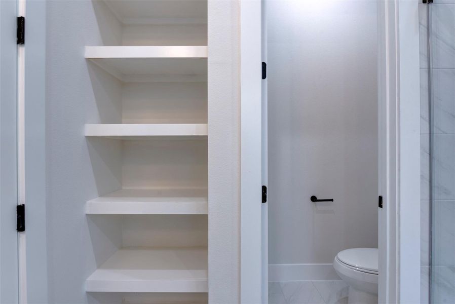 Storage area in the primary bathroom Storage area in the primary bathroom