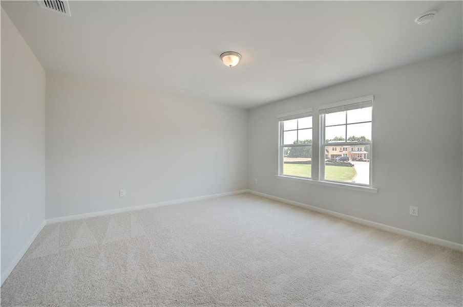 Spacious, unfurnished interior of a new home in Northcroft, Loganville (Image 24).