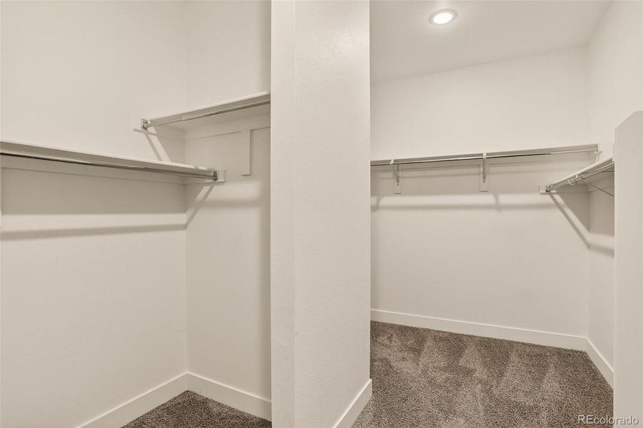 Primary Walk-in Closet Primary Walk-in Closet