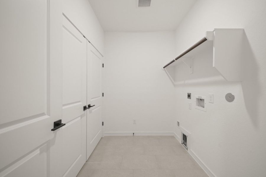 Laundry room (*Photo not of actual home and used for illustration purposes only.)