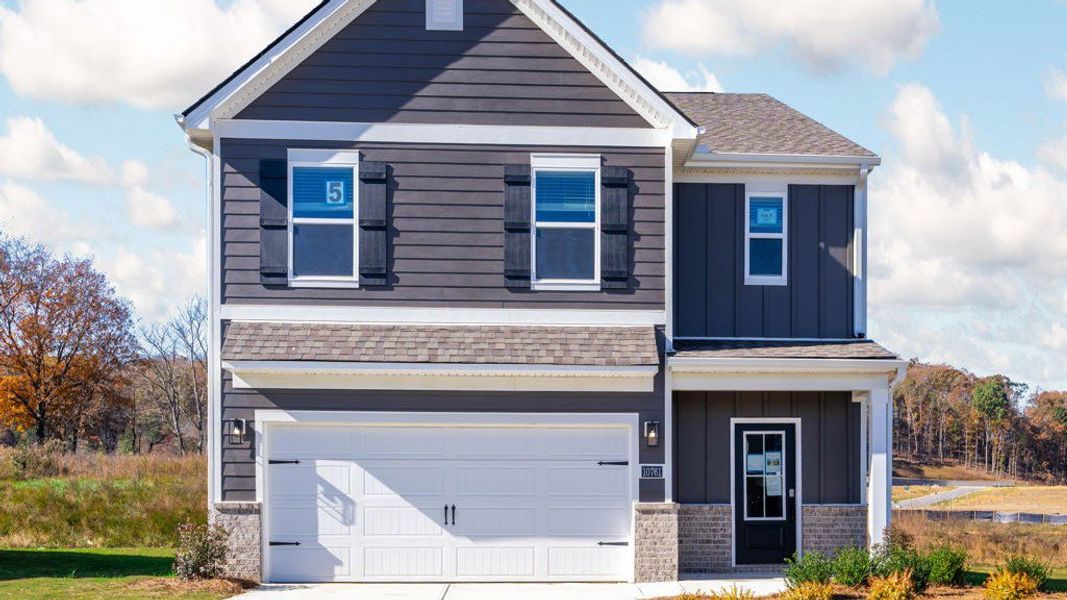 Front exterior of a new home in Prairie Pass, Apison, TN, highlighting curb appeal (Image 22).