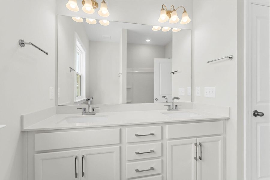 Furnished interior view inside a new home in Tidewater at Lakes of Cane Bay, Summerville (Image 7).