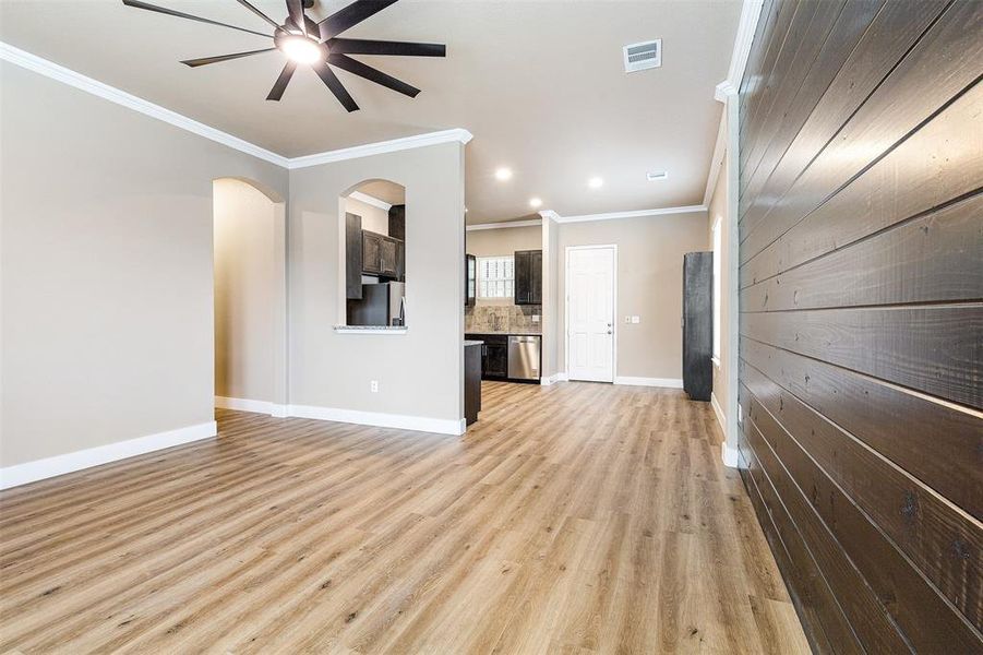 Open concept living with architectural details Open concept living with architectural details