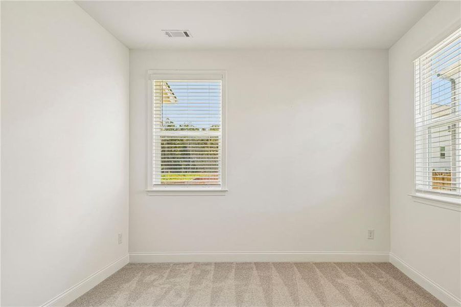 Spacious, unfurnished interior of a new home in Bennett Farm, Loganville (Image 36).