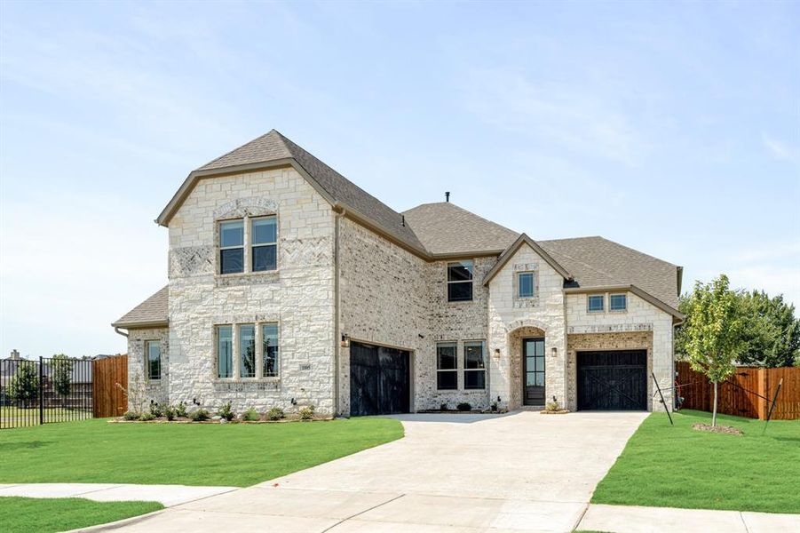 Front exterior of a new home in Mockingbird Heights Classic 60, Midlothian, TX, highlighting curb appeal (Image 25).