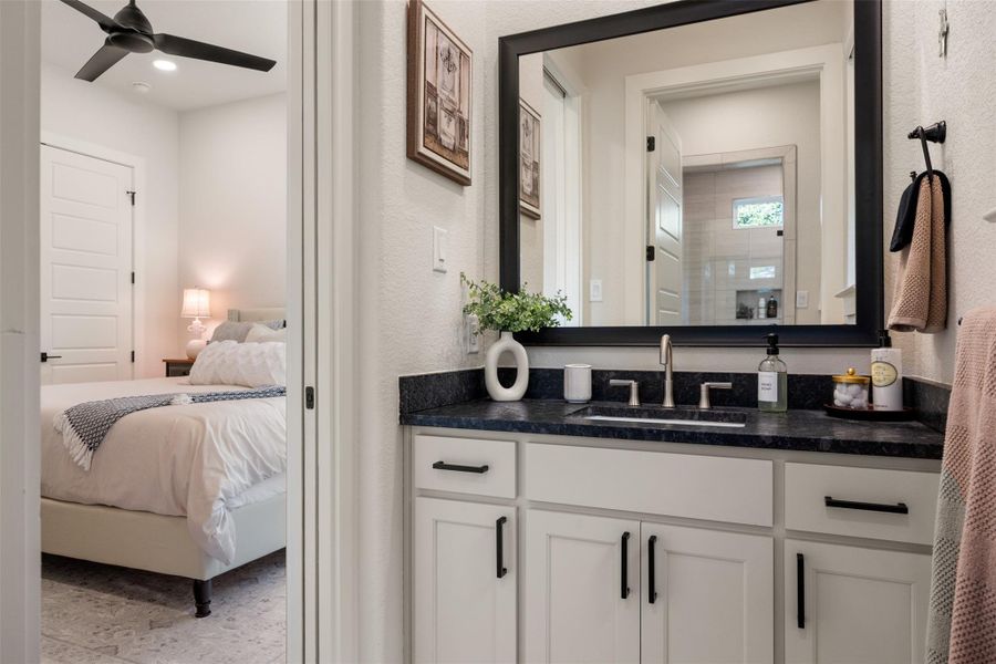 Bathroom with ceiling fan and vanity Bathroom with ceiling fan and vanity