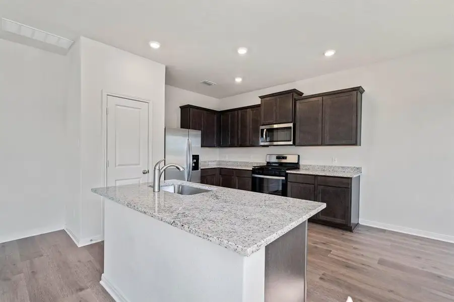 Furnished interior view inside a new home in Big Sky Estates, Ponder (Image 4).
