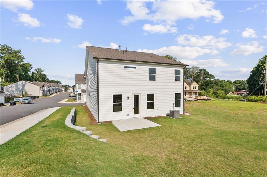 Exterior details and patio area of a home in The Village at Shallowford, Kennesaw (Image 3).
