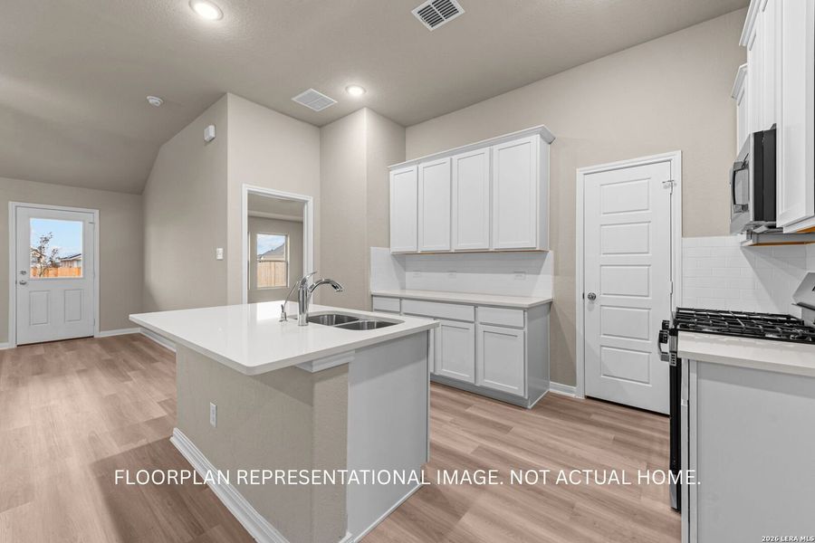 Furnished interior view inside a new home in Agave, San Antonio (Image 8).