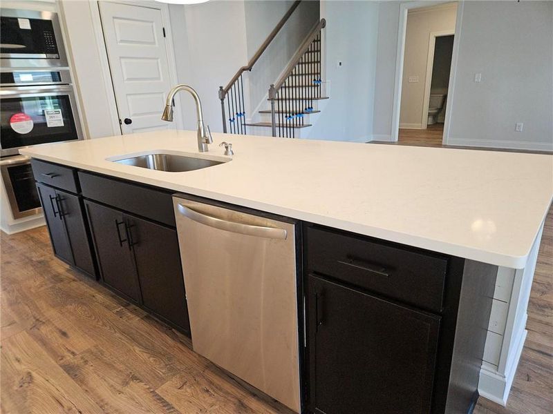 Furnished interior view inside a new home in Calgary Downs, Winder (Image 4).