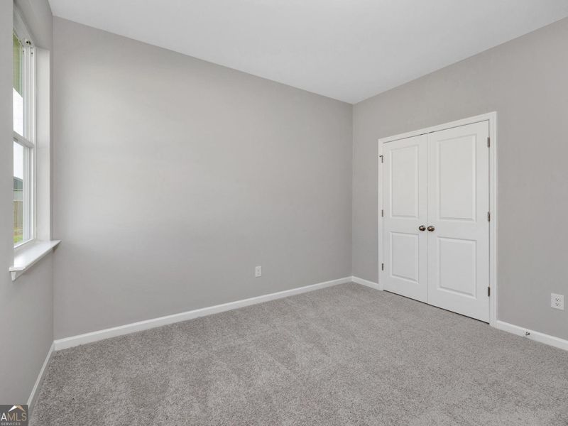 Spacious, unfurnished interior of a new home in Ivy Glen, Perry (Image 12). Spacious, unfurnished interior of a new home in Ivy Glen, Perry (Image 12).