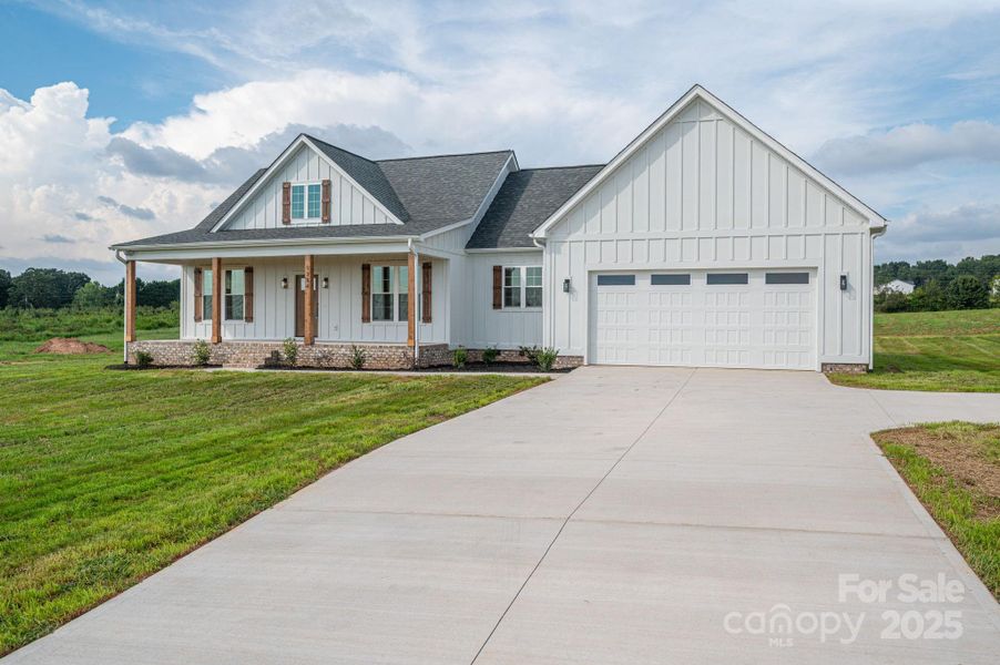 Front exterior of a new home in , Vale, NC, highlighting curb appeal (Image 25).
