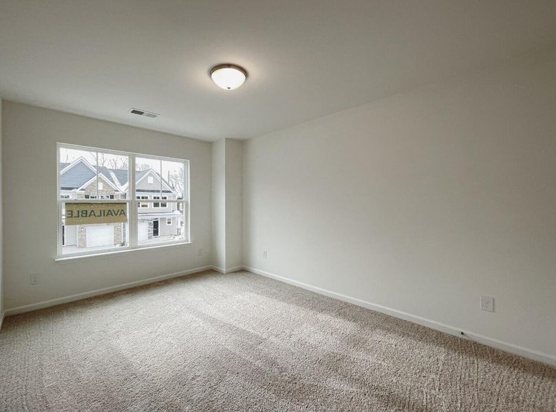 Spacious, unfurnished interior of a new home in East Main Townes, Spartanburg (Image 22).