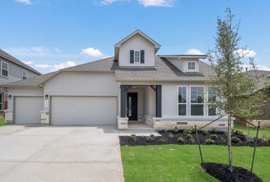 Representative exterior photo of a completed home built from the Englewood by Scott Felder Homes in Prominence, San Antonio, TX (Image 18).
