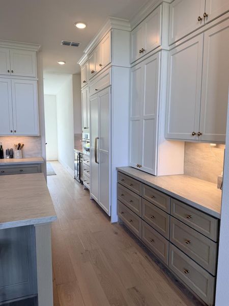 Luxurious kitchen finishes as chosen by our premier design center. Representative image. Luxurious kitchen finishes as chosen by our premier design center. Representative image.