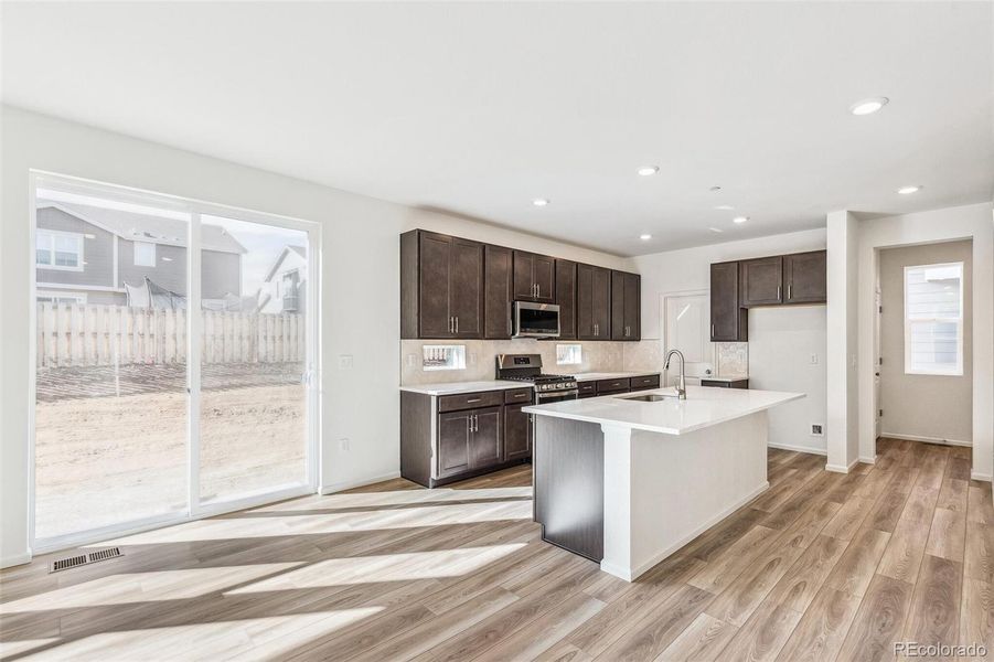 Furnished interior view inside a new home in Turnberry, Commerce City (Image 4).