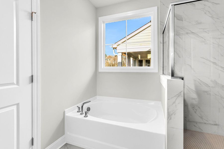 Furnished interior view inside a new home in Tidewater at Lakes of Cane Bay, Summerville (Image 15).