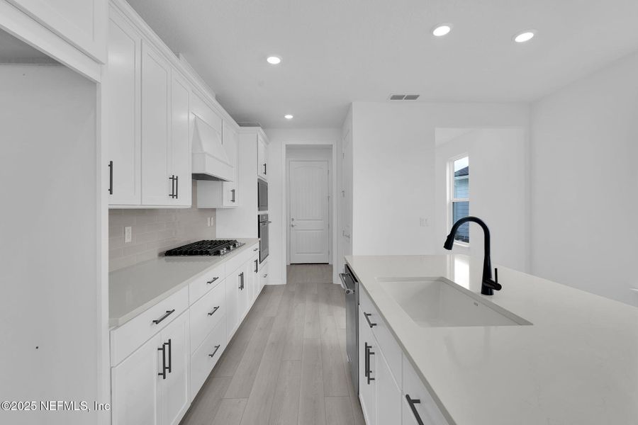 Furnished interior view inside a new home in Summer Bay at Grand Oaks, St. Augustine (Image 8). Furnished interior view inside a new home in Summer Bay at Grand Oaks, St. Augustine (Image 8).