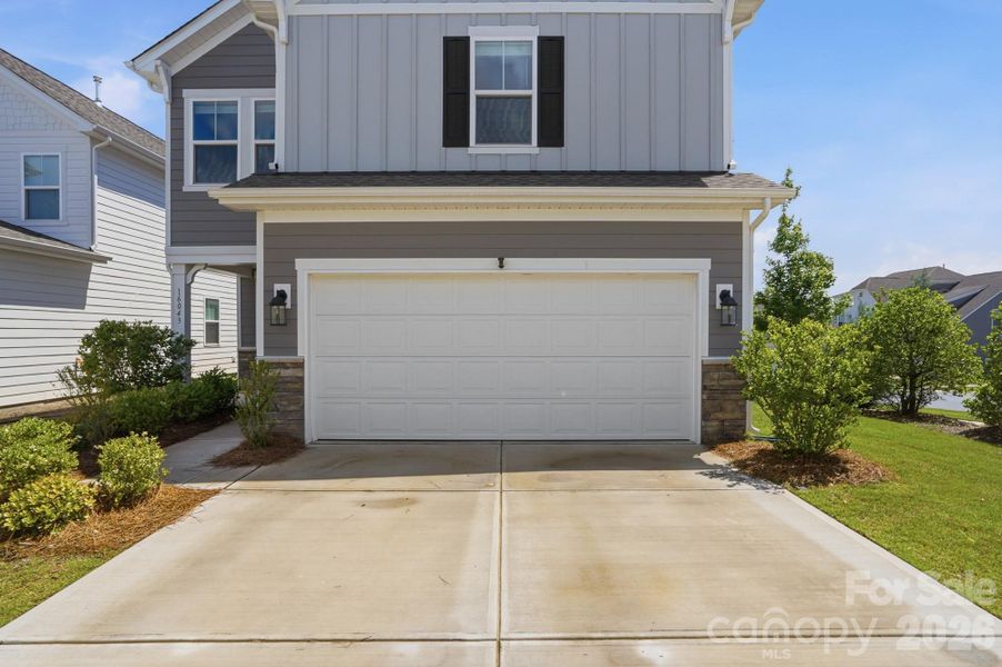 Front exterior of a new home in , Charlotte, NC, highlighting curb appeal (Image 21).